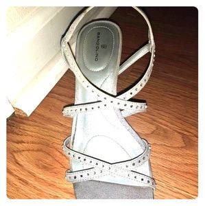 Silver heels with diamond accents on straps